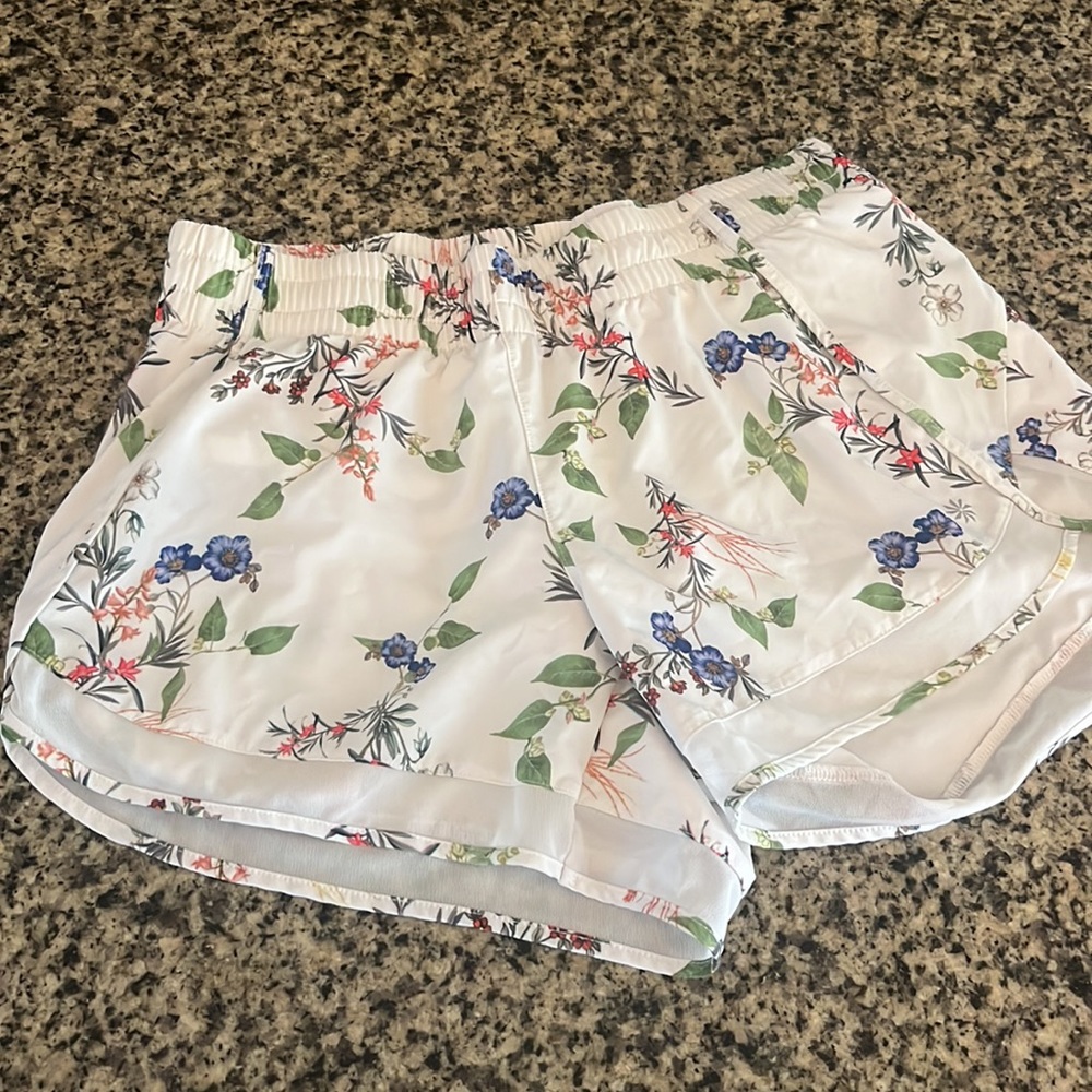 Athleta ivory multicolor floral running shorts